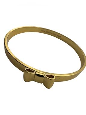 Kate Spade New York Gold Tone Love Notes Bow Hinged Bangle Bracelet